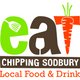 A vibrant scene from the eat:Chipping Sodbury food festival with stalls and visitors enjoying local food.