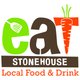 A vibrant scene from the eat:Stonehouse food festival showcasing local food stalls and happy visitors.