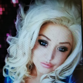 Lucy Floyd as Dolly Parton