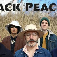 Black Peaches at 10 Feet Tall at The Big Top At 10 Feet Tall
